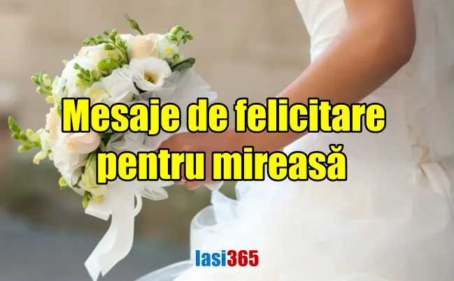 Mireasă superbă în rochie albă primind felicitări de nuntă