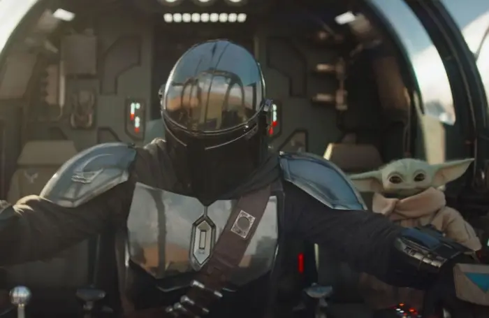The Mandalorian and Grogu – aventură galactică pe marele ecran The Mandalorian și Grogu în cockpit-ul navei, scenă din filmul Star Wars 2026